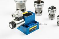 LFA25DRW2-7X/210 - Крышка для логического клапана, типоразмер Ду25 функционал - DRW2 = крышка с редукционным клапаном с ручной настройкой с функцией запирания, под установку распределителя Ду6, три выхода Z2, X и Y, элемент регулировки - винт под шестигра